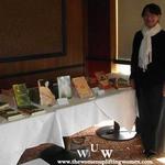 December 9, 2011 Women Uplifting Women Luncheon key note speaker Wanda Winters-Gutierrez displaying her books.
